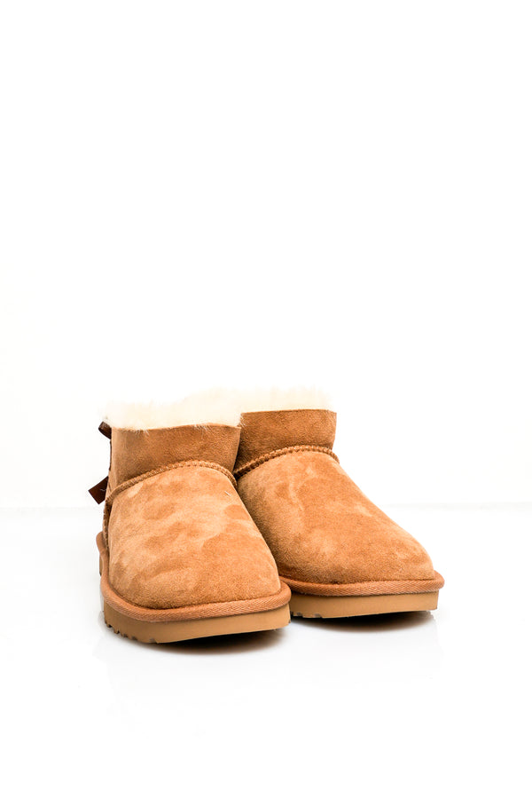 Stivali Donna Ugg W ULTRA MINI BAILEY BOW 1185491 CHESTNUT W ULTRA MINI BAILEY BOW 1185491 CHESTNUT Ugg 
