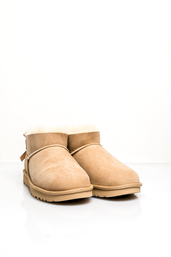 Stivali Donna Ugg W ULTRA MINI BAILEY BOW 1185491 SAND W ULTRA MINI BAILEY BOW 1185491 SAND Ugg 