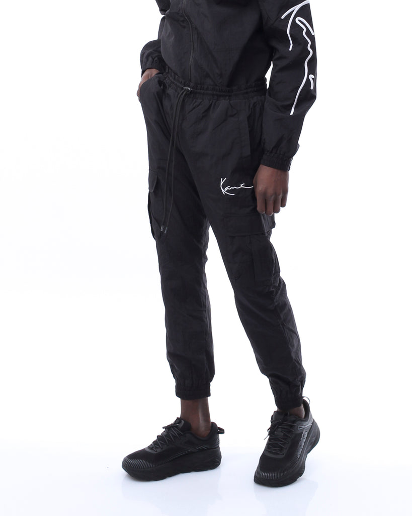 Pantalone tuta Uomo Karl Kani SIGNATURE TRACKPANTS BLACK SIGNATURE TRACKPANTSBLACK Karl Kani